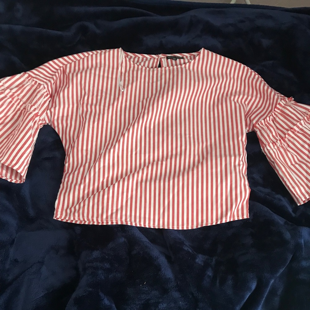 A medium sized shirt , never worn